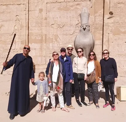 Happy travelers at Egyptian temple